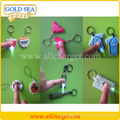 Free logo print Mini LED keychain light waterproof soft pvc customized shape